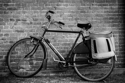Bike against brick wall.