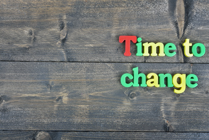 Time to Change in plastic letter on a wooden table