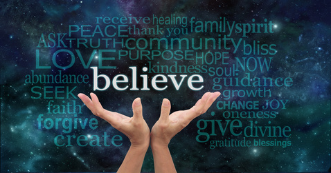 Photo of hands cupped with the word Believe and other associated words coming from them.